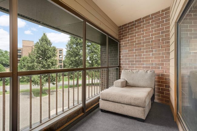 Enclosed porch offers a bonus space year-round | Image 26