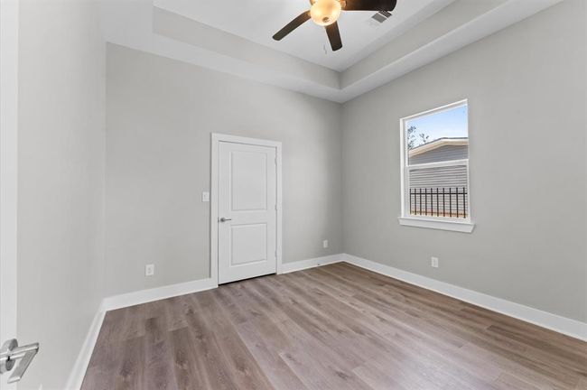 Third bedroom with modern finishes and no carpet. | Image 23