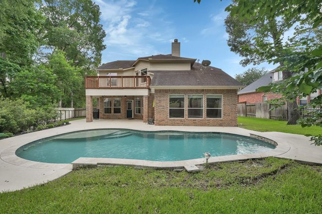 The gunite pool comes with a detachable safety fence (not pictured), perfect for keeping children and pets safe. | Image 42