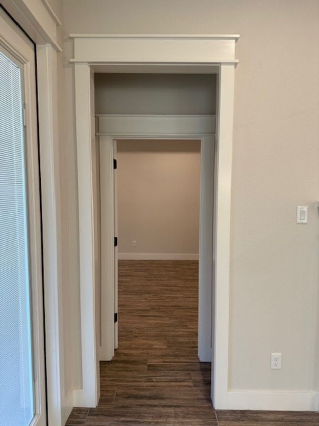 Hallway featuring wood finished floors | Image 30