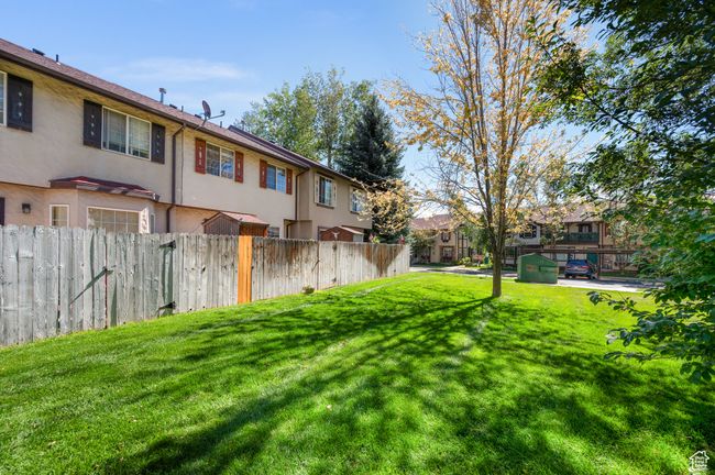 View of yard with a residential view | Image 26