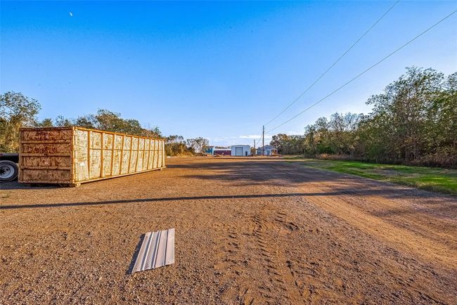 Ample parking space available, providing room for multiple vehicles, boats, or RVs. Ideal for hosting guests or accommodating larger households. | Image 15
