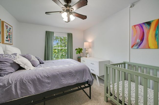 Bedroom featuring carpet floors and a ceiling fan | Image 15