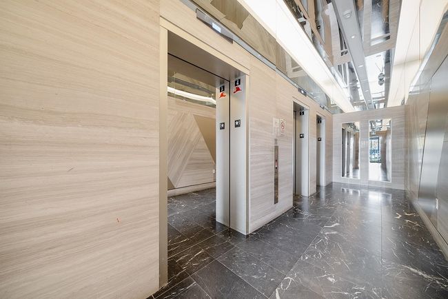 Hall with elevator and marble tiled flooring | Image 22