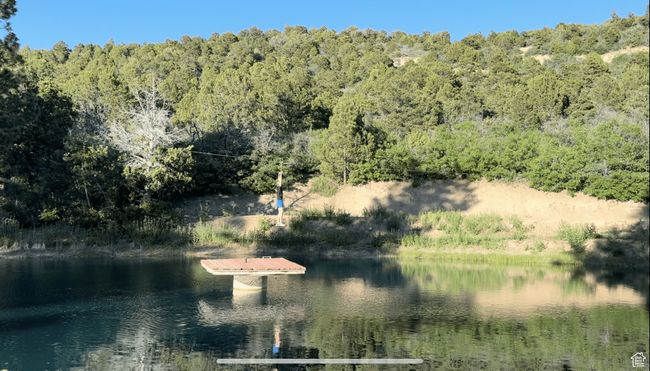 Property view of water with a forest view | Image 33