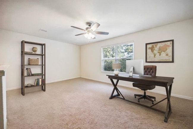 Bedroom #3 perfectly doubles as a home office or a game room!**Virtually staged for your inspiration** | Image 4