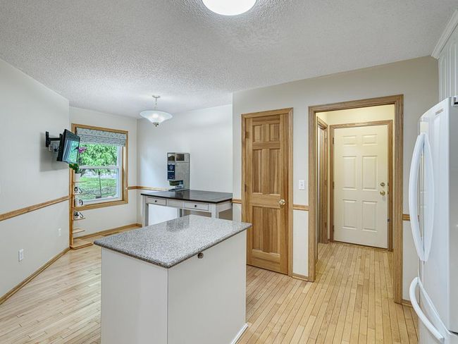 Note the hardwood floors throughout the main level of the home. | Image 6