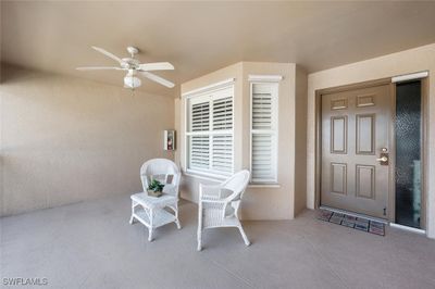 Doorway to property with ceiling fan | Image 3