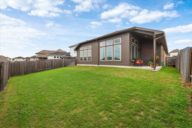 181 Durian Loop, House other with 3 bedrooms, 2 bathrooms and null parking in Buda TX | Image 24