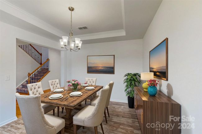 Formal dining showing with virtual staging | Image 18