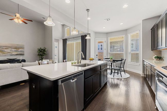 A very functional work space, too. Nice stainless steel appliances and a recent refrigerator | Image 11