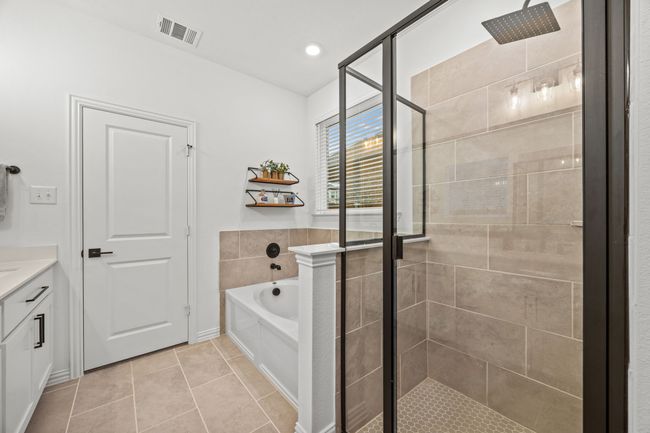 Full bathroom with a stall shower and a garden tub | Image 19