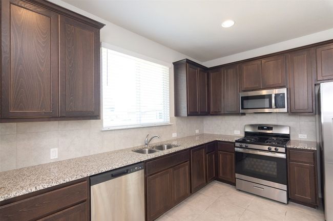 350 Fabion St, House other with 4 bedrooms, 2 bathrooms and 4 parking in Kyle TX | Image 5