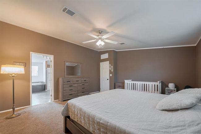 With thoughtful details like beautiful tilework and ample storage in cupboards and drawers, you'll find everything you need to enhance your daily routine. | Image 29