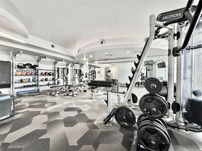 Exercise room with carpet floors | Image 32