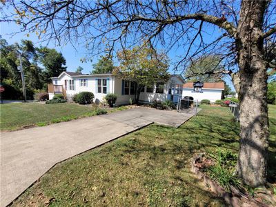 Convenient off street parking area for NO STEP ACCESS to the house! | Image 2