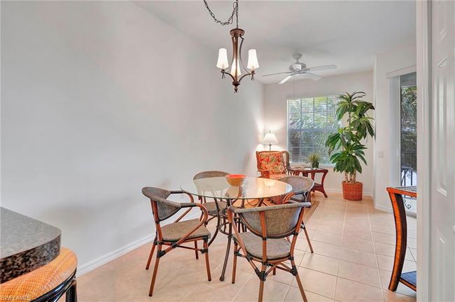 Breakfast Nook area featuring ceiling fan | Image 14