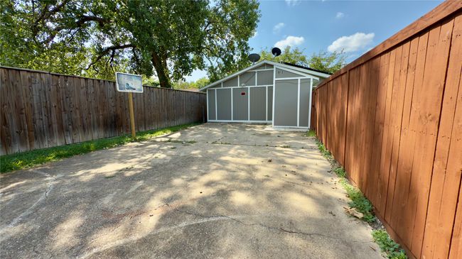 View of patio / terrace featuring a storage unit | Image 35