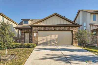 Nestled in the picturesque Texas Hill Country, this residence combines the beauty of nature with modern design, providing a perfect backdrop for your lifestyle. | Image 1