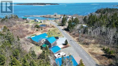 11 Cook Rd, House other with 3 bedrooms, 3 bathrooms and null parking in Grand Manan NB | Image 1