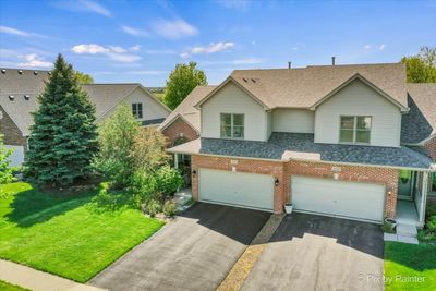 556 Sudbury Circle, Home with 2 bedrooms, 3 bathrooms and 2 parking in Oswego IL | Image 1