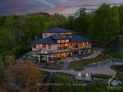 325 Berry Side Rd, House other with 3 bedrooms, 7 bathrooms and 10 parking in Dunrobin ON | Image 3