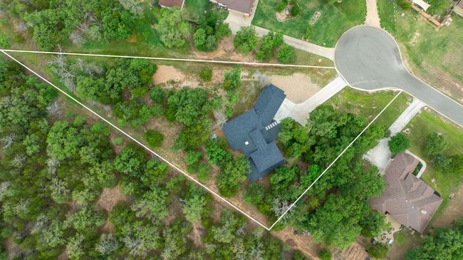 Bird's eye view of home on lush acre lot | Image 37