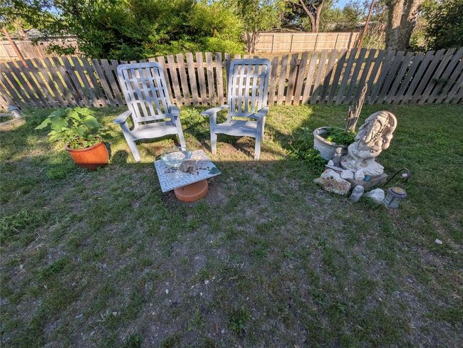 View of yard with a fenced backyard | Image 28