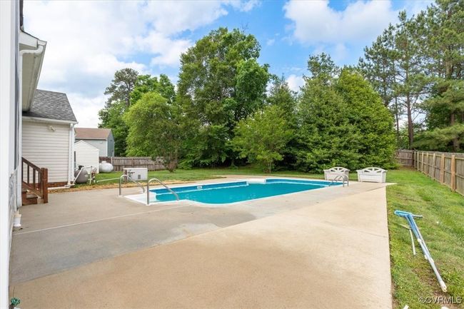 View of pool with a patio | Image 46