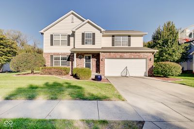 Welcome home! This 4 bedroom, 2.5 bathroom home with a finished basement is located in Spring Creek at 146th & Hazel Dell in Carmel. | Image 1