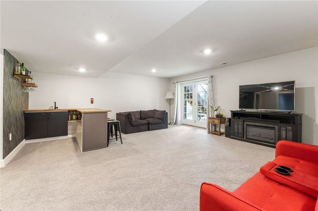 The Finished Walk Out Lower Level Offers An Amazing Game Room | Image 32