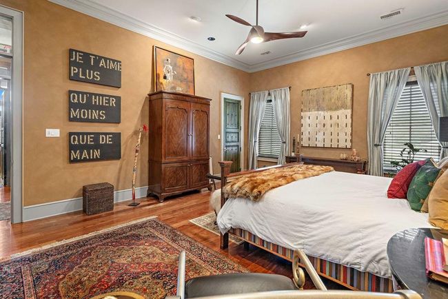 Spacious primary bedroom complete with a custom closet w/built-ins. | Image 21