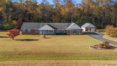 Ranch-style house with a front lawn | Image 2