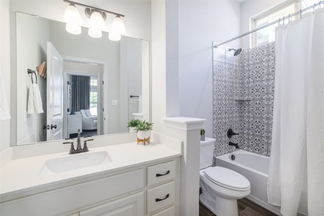 Full bath with vanity, shower/tub combination | Image 24