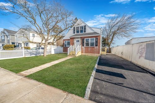 8 Rockaway Ave, Westbury, NY, 11590-4129 | Card Image