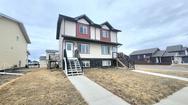11428 106 Avenue, Home with 2 bedrooms, 1 bathrooms and 2 parking in Grande Prairie AB | Image 1