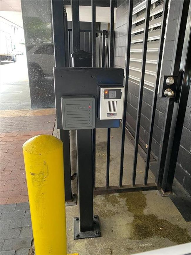 Enter parking garage off Travis and they will buzz you in. | Image 34