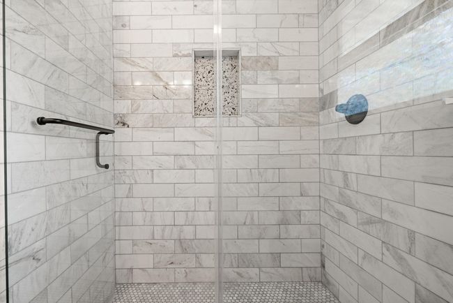 Bathroom with a shower stall | Image 21