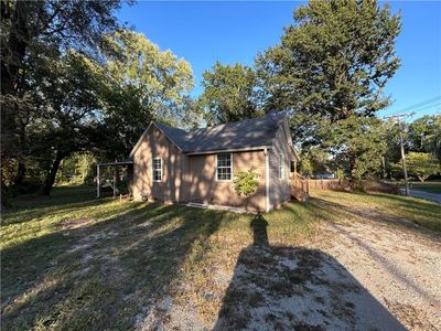 View of property exterior featuring a yard | Image 2