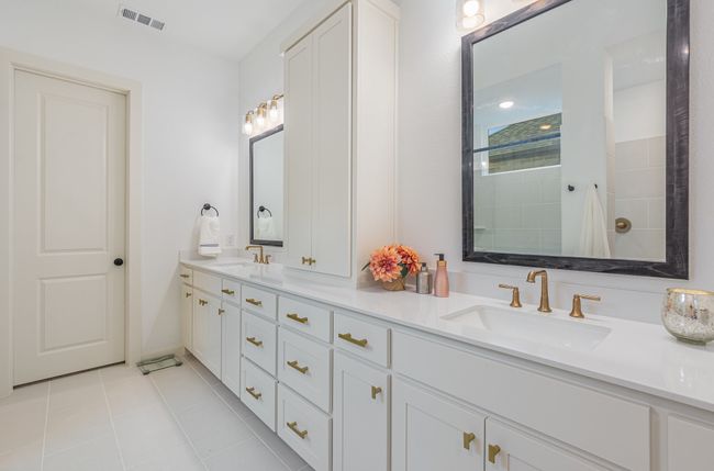 Full bath featuring double vanity and tile patterned floors | Image 30
