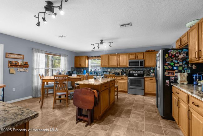 10457 Cranston St, House other with 5 bedrooms, 2 bathrooms and null parking in Spring Hill FL | Image 41