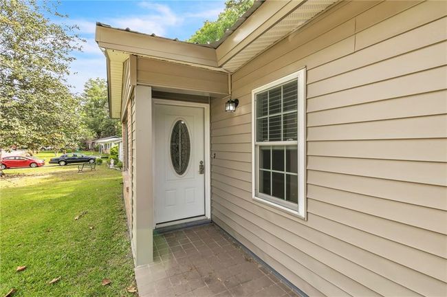 Entrance to property featuring a yard | Image 7