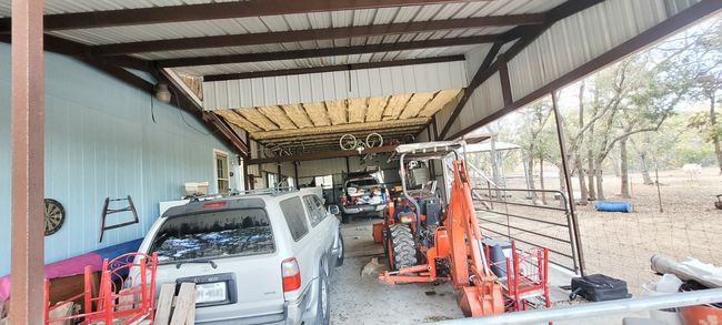 This huge garage can house up to 4 vehicles and has also been used for church gatherings. | Image 15
