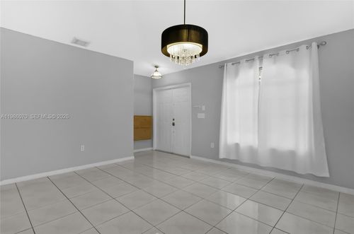10168 126th Ter, Hialeah Gardens, FL, 33018-7429 | Card Image