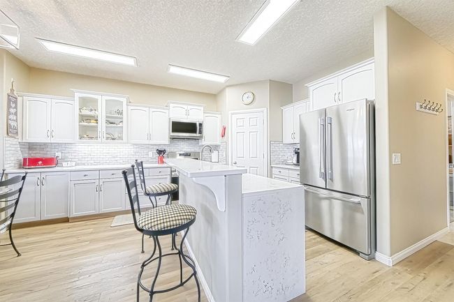 149 Bow Ridge Cres, House detached with 3 bedrooms, 3 bathrooms and 4 parking in Cochrane AB | Image 13