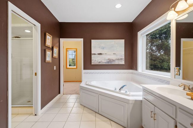 Large primary bath with tub and separate shower | Image 41