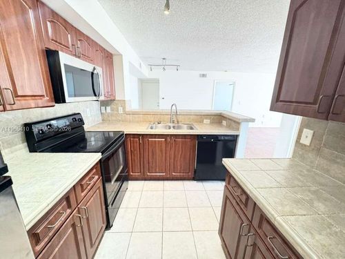 102-1715 Village Blvd, West Palm Beach, FL, 33409-2012 | Card Image