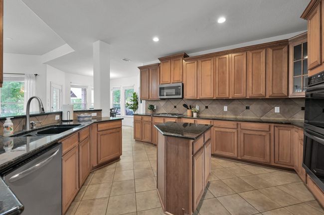 Generous cabinet storage gives you the ability to keep everything organized and tucked away. Speaking of storage... | Image 16