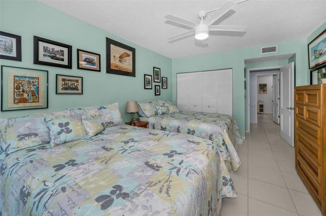 Looking across the hall at the gorgeous guest bath with walk in shower and all updated details! | Image 27