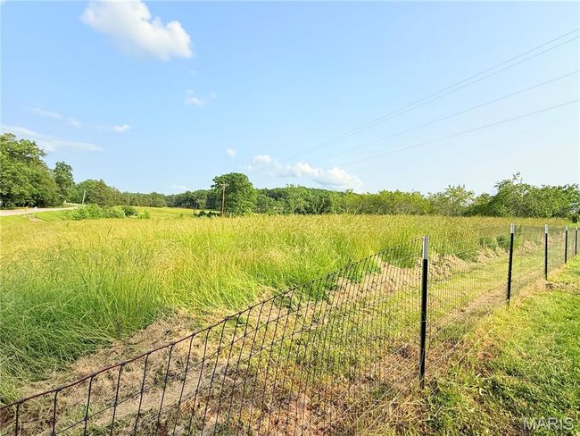 View of yard with a view of countryside | Image 56